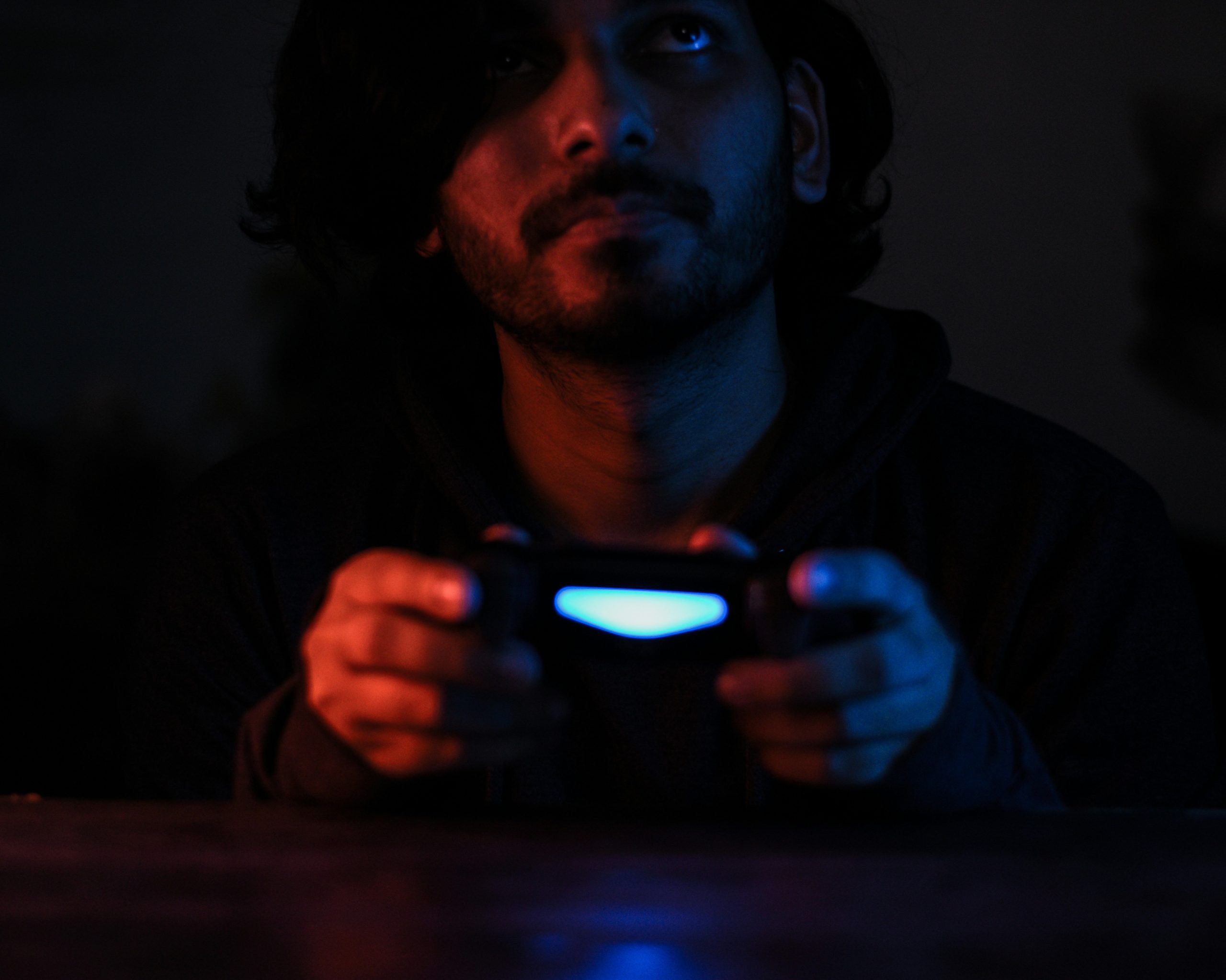 A gamer looking frustrated at a computer screen