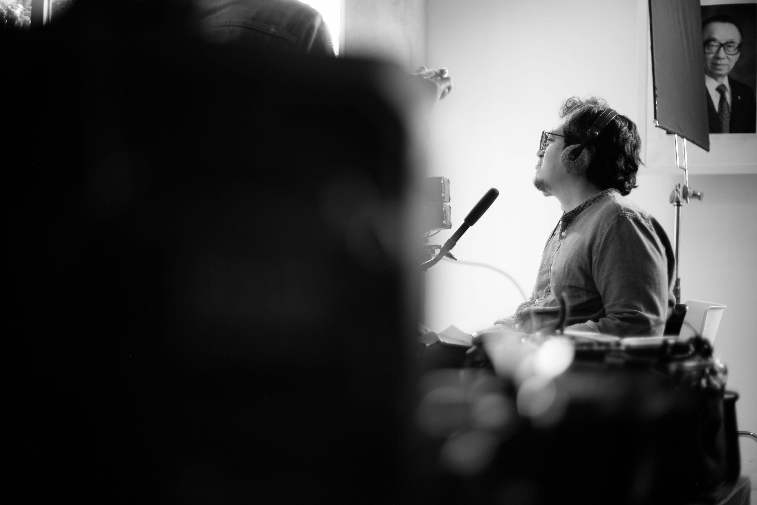 Screenshot of a well-lit streaming setup with multiple monitors