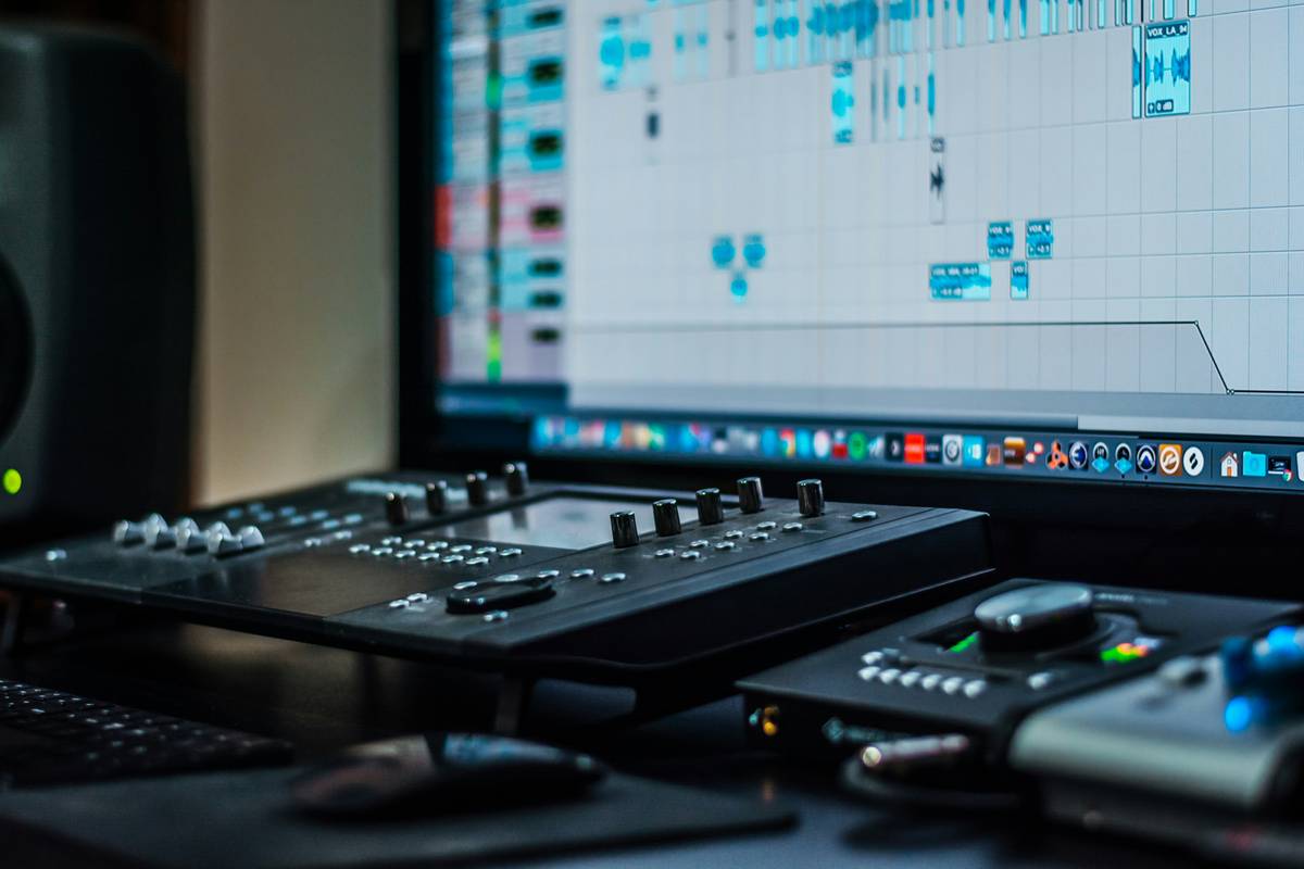 Blurry image of a low-budget microphone producing distorted sound waves