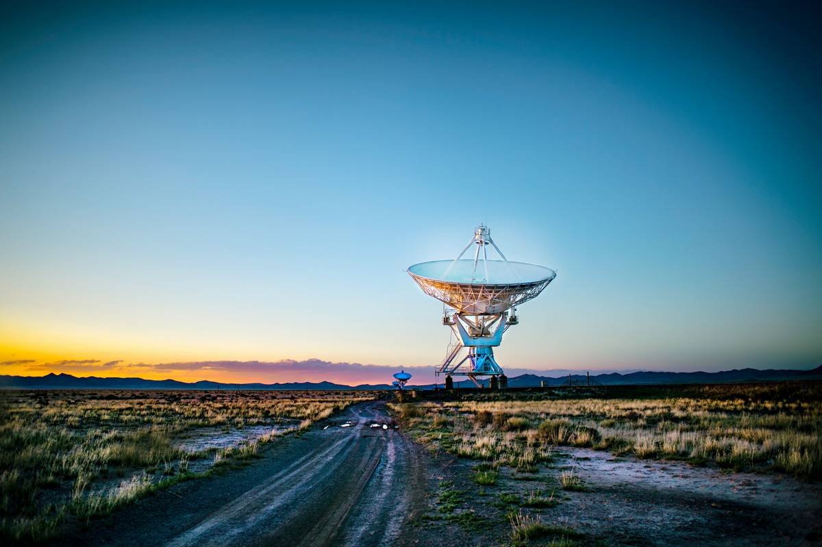 Early in the morning and quite chilly even for New Mexico high desert. I was on a motorcycle road trip and wanted to catch the early light with these fascinating telescopes in the middle of nowhere, New Mexico. A light powdering of snow made the surrounding desert quite muddy, so I had to keep my distance.