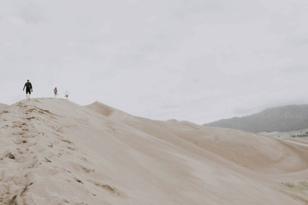 man standing on dessert land